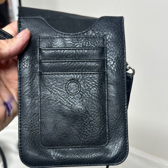 Stylish Black Crossbody Bag with Tassel Detail - Picture 2 of 9